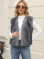 Outdoor view of a fluffy grey faux fur vest with a V-neck and sleeveless cropped design - S / Gray-threaded