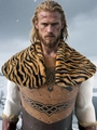 Men's Viking warrior costume with faux fur cape and leather chest armor in snowy wild - Zebra Print