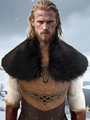 Detail of Viking chest armor with Celtic knot patterns and black faux fur collar - Black