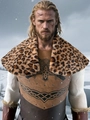 Detail of Viking chest armor with Celtic knot patterns and faux fur warrior cape - Yellow Leopard