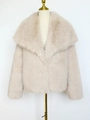 Giacca corta in ecopelliccia beige chiaro da donna con ampio colletto a revers e maniche lunghe - XS / Albicocca