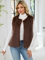 Elegant brown faux fur vest for women, sleeveless V-neck jacket styled with jeans - Coffee