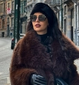 Detailed texture of brown faux fur winter headband and matching warm coat for women - Black Short Fur