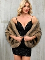 Elegant brown faux fox fur shawl wrap paired with a sparkling black sequin party dress - Camel-threaded