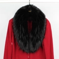 Detailed close-up of the plush black faux fur collar on a stylish red knitted cardigan - Black Jacquard Black