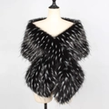 Detail of cross-wrapped faux fox fur shawl with black and white textured plush texture - Black and White Jacquard