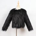 Detail of black faux fur kid jacket on wooden mannequin featuring long plush texture - S / Black