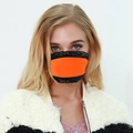Close-up of vibrant orange sun protection face mask with black lace trim on a model - One Size / Orange