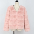 Detail view of pink faux fur jacket with horizontal patchwork texture and V-neckline - S / Nude Pink