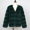 Deep green faux fur plush jacket with horizontal paneling and V-neckline on mannequin - S / Dark Green