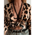 Sexy leopard print tie-front crop top with black strappy bralette and denim jeans - S / Black