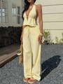 Zweiteiliges Damen-Sommerset mit gelbem Neckholder-Top und weit geschnittener Hose - S / Gelb