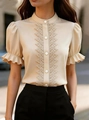 Close-up of stand collar lace patchwork and puff sleeves on apricot summer blouse - S / Tops / Khaki