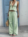 Zweiteiliges Damen-Sommerset mit hellgrün gestreiftem Halter-Top und weiter Hose - S / Grün