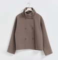 Close-up of a brown double-breasted wool coat with a high stand collar and button details - S / Tops / Khaki