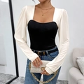 Elegante body ajustado negro con mangas abullonadas blancas en contraste y cuello cuadrado - S / Negro