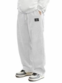 Detail of light gray corduroy trousers featuring a drawstring waistband and ribbed texture - S / White