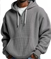 Détail d'un sweat à capuche gris pour hommes en tissu gaufré avec demi-fermeture éclair - S / Hauts / Gris clair