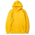 Classic yellow cotton hoodie with kangaroo pocket and ribbed cuffs in a clean flat lay view - Yellow