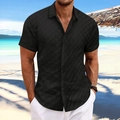 Close-up of black men's short sleeve shirt featuring geometric jacquard pattern details - S / Black