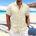 Close-up of men's cream short sleeve shirt featuring textured jacquard plaid fabric - S / Off White
