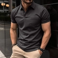 Detail of slim fit dark grey polo shirt showing the chest pocket and turn-down collar - 4XL / Black