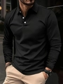Detail eines klassischen schwarzen Langarm-Poloshirts mit Dreiknopfleiste und Kragendetails - S / Schwarz