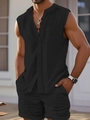 Detail of men's black sleeveless summer set showing jacquard texture and V-neckline - S / Black