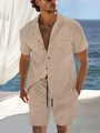 Close-up of lightweight textured fabric on men's summer shirt and shorts vacation set - Khaki