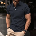 Close-up of navy slim fit polo shirt featuring contrasting white buttons and textured fabric - S / Navy Blue