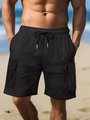 Detail of men's black cargo shorts featuring elastic drawstring waist and large side pockets - S / Black