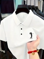 Close-up of white breathable waffle texture fabric on men's short sleeve polo shirt - S / White