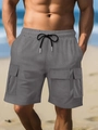 Detail of grey cargo shorts with elastic drawstring waist and functional large side pockets - S / Dark Gray