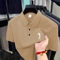 Detailed view of khaki waffle knit texture and golf logo on men's short sleeve polo shirt - S / Khaki