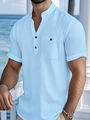 Dettaglio camicia in lino azzurro con colletto alla coreana e taschino con bottone - S / Celeste