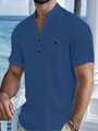 Detail of blue linen Henley t-shirt with stand collar and pocket on a coastal balcony - S / Dark Blue