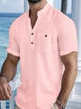 Close-up of light pink cotton linen Henley shirt with buttoned collar and chest pocket - S / Pink
