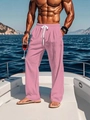 Close-up of pink linen trousers with elastic drawstring waist on a yacht deck - S / Pink