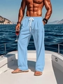 Close-up of light blue linen pants featuring elastic waistband and white drawstring - S / Sky Blue