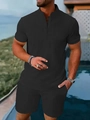 Detail of black men's textured Henley shirt and shorts set on model by the pool - S / Black