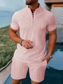 Detailed view of pink men's summer set with textured fabric in a resort vacation setting - S / Pink