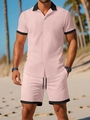 Détail de l'ensemble homme en maille jacquard rose avec bordures noires contrastées - S / Rose