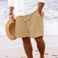 Detail of men's khaki beach shorts featuring vertical stripes and white drawstring waist - S / Caramel color