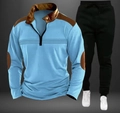 Détail du polo zippé bleu clair et pantalon noir avec des empiècements en cuir marron - S / Bleu Ciel