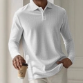 Detailed macro view of white long-sleeved polo shirt with textured waffle knit pattern - S / White Plaid Pattern