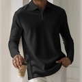 Detail shot of men's black long sleeve polo shirt featuring textured herringbone knit fabric - S / Black Plaid Pattern