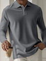 Detailed macro view of gray men's polo shirt featuring 3D textured knit fabric and buttons - S / Gray Plaid Pattern