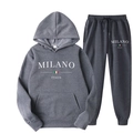 Detail of dark grey fleece hoodie set with white Milano Italia logo on flat white background - XS / Top And Bottom / Dark Gray