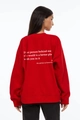 Back view of red fleece sweatshirt with white inspirational quote and ribbed cuffs - S / Red