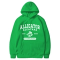 Detail of green hoodie featuring vintage alligator alcatraz graphic and kangaroo pocket - Grass Green